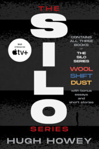 Cover of Silo (omnibus) by Hugh Howey. Black background with white title and smaller red, green, and yellow titles of books, with a white circle containing a logo for Apple TV.